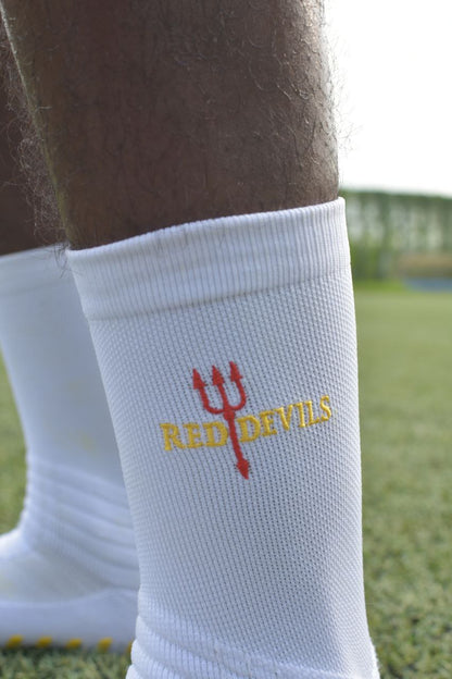 Anti-slip football socks with enhanced grip for better traction